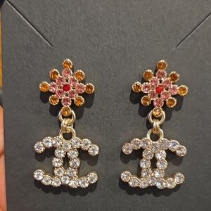 Elegant Gold and Pink Crystal Logo Earrings